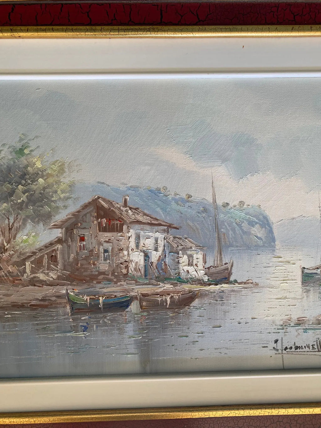 Huile sur toile marine, au décors d'un lac ,tableau signé, thème de bateaux et d'une cabane. Antiquités de France